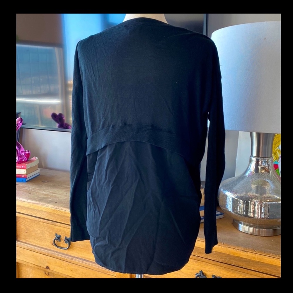 TopShop basic black Long black shirt with details in the back  Size 8